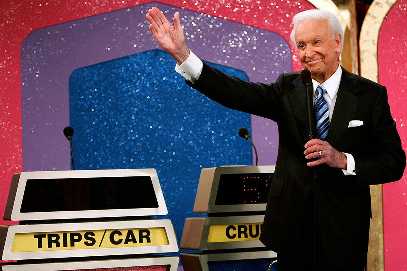 FILE - Legendary game show host Bob Barker, 83, waves goodbye as he tapes his final episode of "The Price Is Right," in Los Angeles on Wednesday, June 6, 2007. Barker signed off from 35 years on the game show and 50 years in daytime TV in the same low-key, genial fashion that made him one of daytime TV's biggest stars. (AP Photo/Damian Dovarganes, File)