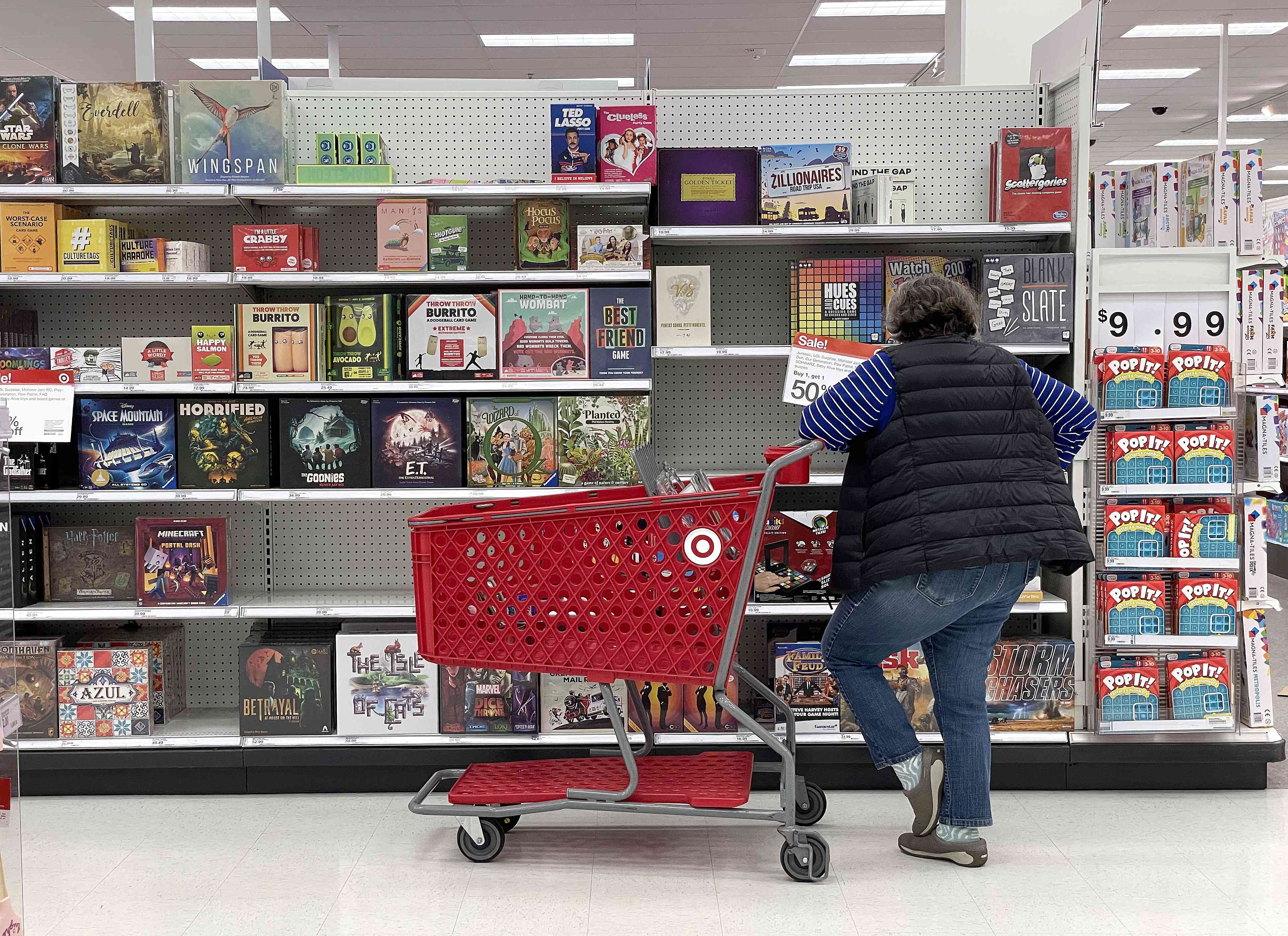 A Target customer looks at a display of board games while shopping at Target store on December 15, 2022 in San Francisco, California.