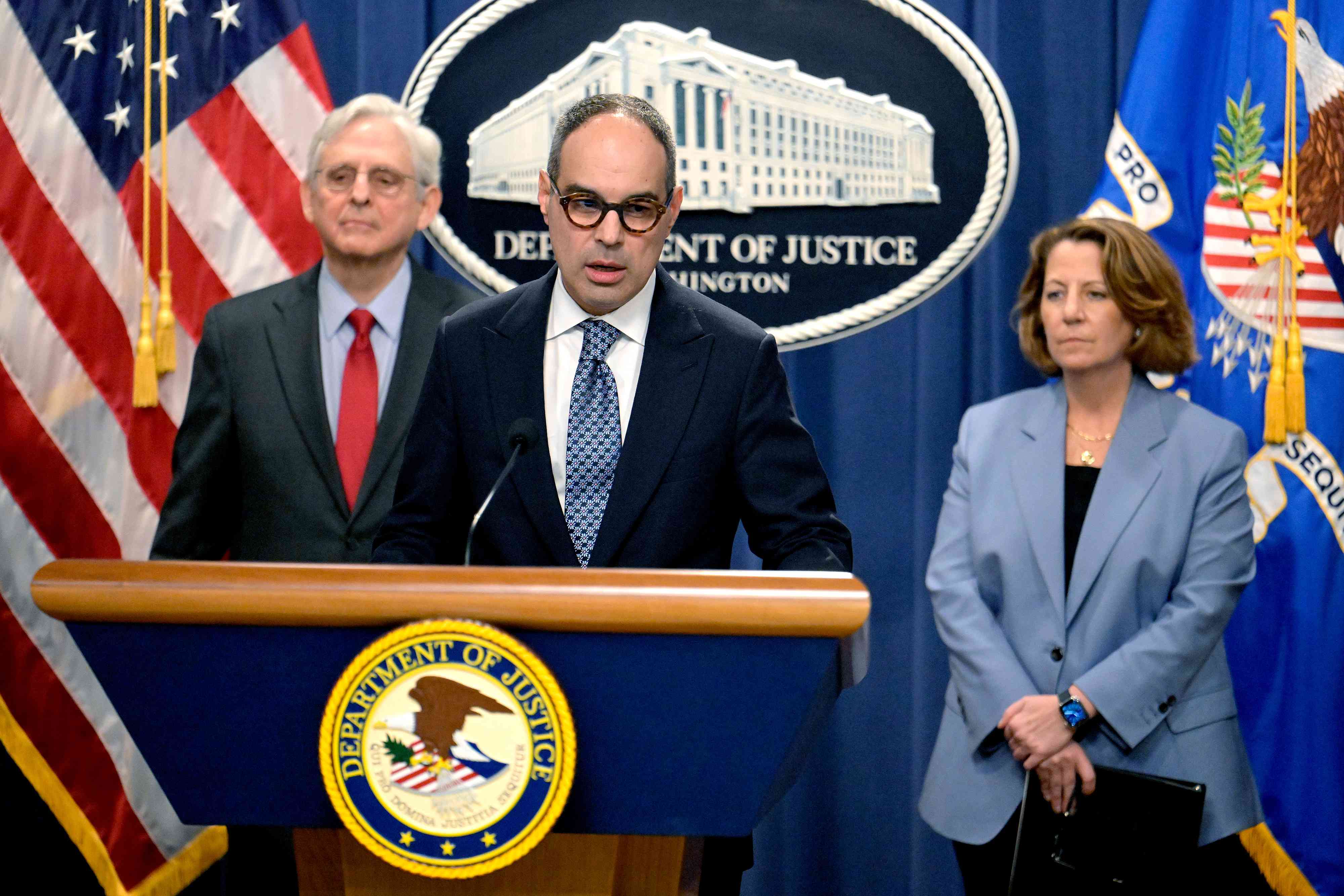 Merrick Garland, US attorney general, from left, Jonathan Kanter, assistant attorney general of antitrust for the US Department of Justice, and Lisa Monaco, deputy US attorney general, during a news conference at the Department of Justice (DOJ) in Washington, DC, US, on Thursday, May 23, 2024. 