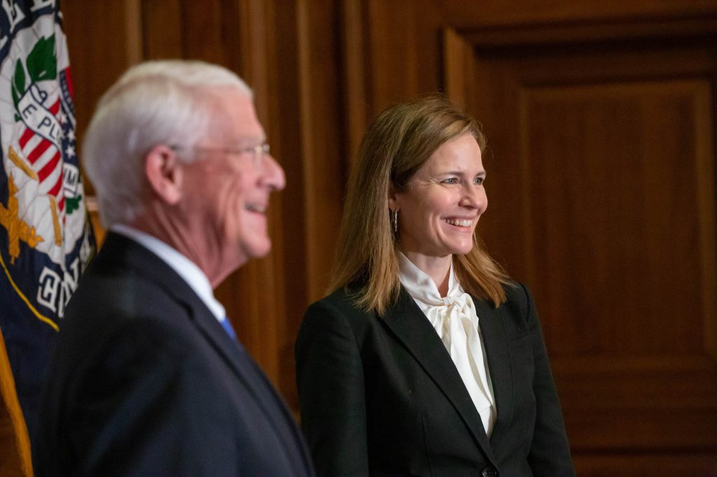 Senator Roger Wicker smiles alongside Amy Coney Barrett