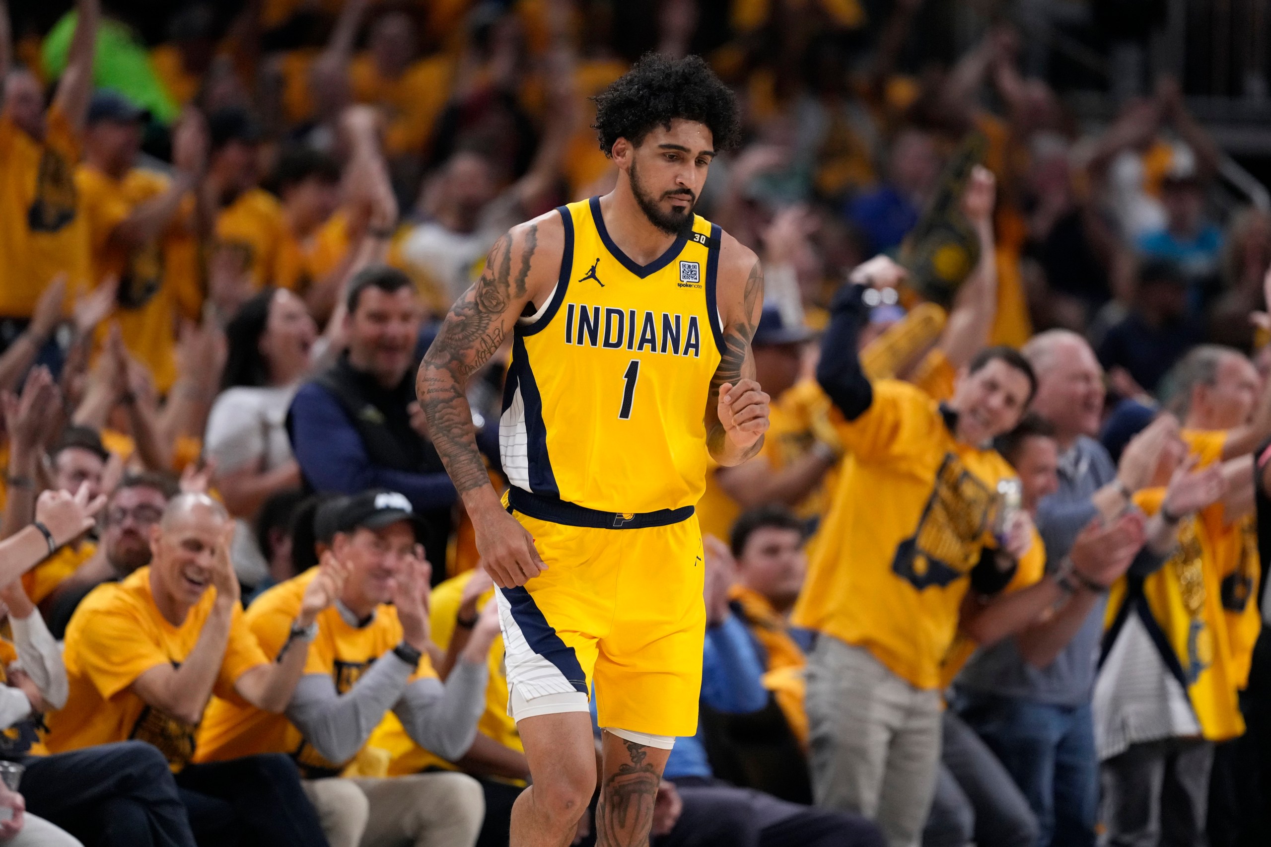 Indiana Pacers forward Obi Toppin (1) celebrates after making a basket during the first half of Game 4 of the NBA Eastern Conference basketball finals against the Boston Celtics, Monday, May 27, 2024, in Indianapolis. (AP Photo/Michael Conroy)