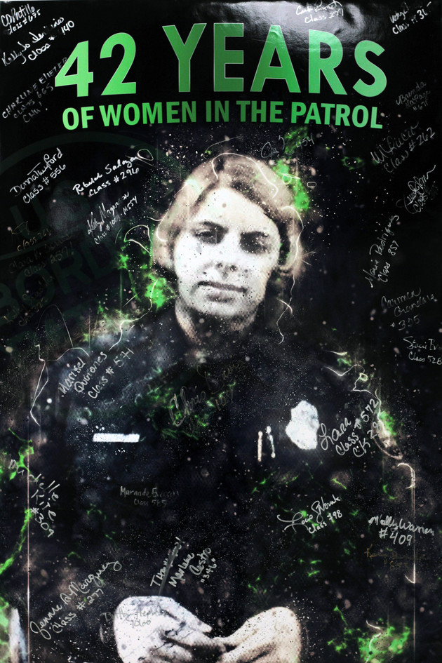 At the Border Patrol Museum in El Paso, a poster celebrates the first woman accepted into the agency.