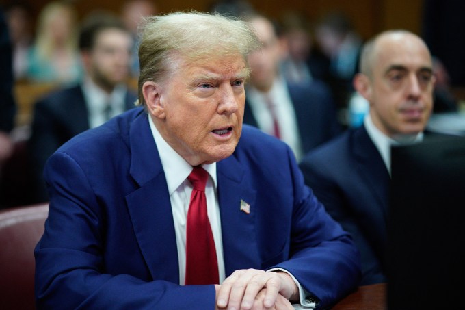Former US President Donald Trump looks on in the courtroom, during his trial for allegedly covering up hush money payments linked to extramarital affairs, in New York City, on April 30, 2024. Trump, 77, is accused of falsifying business records to reimburse his lawyer, Michael Cohen, for a $130,000 hush money payment made to porn star Stormy Daniels just days ahead of the 2016 election against Hillary Clinton. (Photo by Eduardo Munoz / POOL / AFP) (Photo by EDUARDO MUNOZ/POOL/AFP via Getty Images)
