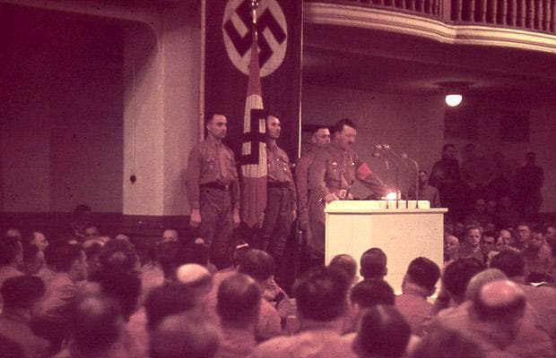 Hitler speaks in Munich on the 15th anniversary of the 1923 Beer Hall Putsch, in which Hitler and other Nazi party members attempted to overthrow the German government on November 8th, 1938