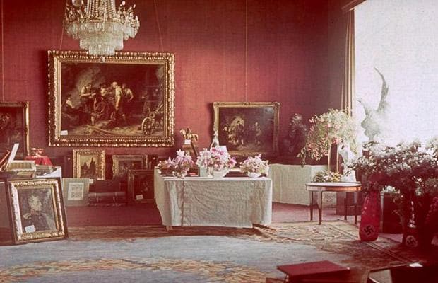 View of a room in the Reichs Chancellory that contains some of the birthday presents presented to Adolf Hilter on his 50th birthday, Berlin, Germany, April 20, 1939. Among the gifts are framed oil paintings and texts, sculptures, and vases of flowers