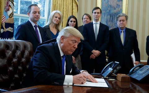 Trump signing executive orders on Tuesday