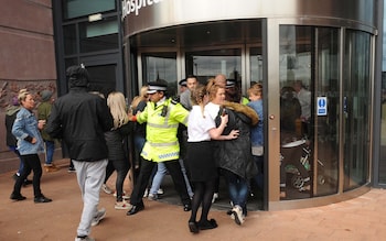 Police block protesters from the entrance to Alder Hey Children's Hospital in Liverpool 