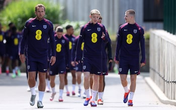 The England players walk to training