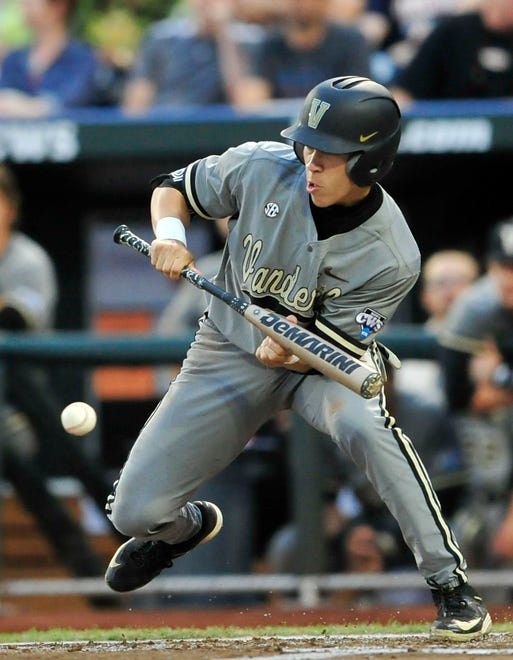 2017: Jeren Kendall - Vanderbilt's Jeren Kendall bunts the ball against Virginia during the 5th inning in the Game 2 of the College World Series finals at TD Ameritrade Park, Tuesday, June 23, 2015, in Omaha, Neb.