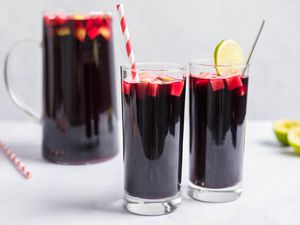 Two glasses and a pitcher full of Chicha morada
