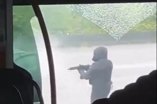 Men with pump action shotguns freed an inmate from a prison van