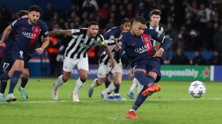 Kylian Mbappé converts a penalty against Newcastle, who went out in the group stages after claiming that they were hamstrung by PSR limits