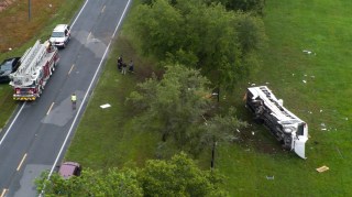 The aftermath of the crash showed how far the bus ended up from the road
