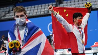 China’s Wang Shun, right, won the 200m individual medley at the Tokyo Olympics ahead of Great Britain’s Duncan Scott, left, despite being among the athletes to fail a test