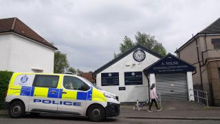 Police officers were seen entering A Milne’s premises in Balornock, Glasgow, on Monday