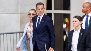 Hunter Biden leaving court with his wife, Melissa Cohen Biden, after the first day of arguments