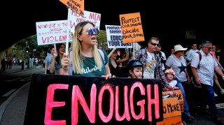 Demonstrators in Sydney were among tens of thousands of Australians who marched in protest at violence against women
