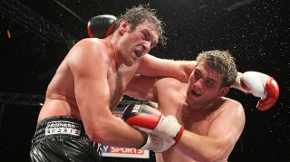Fury, left, and McDermott fight for the English title in 2009