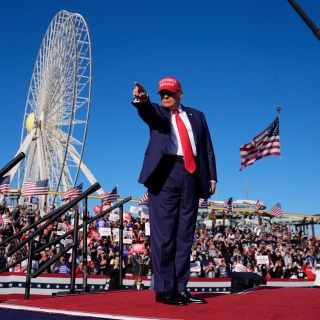 Donald Trump gestures to the crowd at the rally in Wildwood, New Jersey, which is estimated to have attracted between 80,000 and 100,000 people