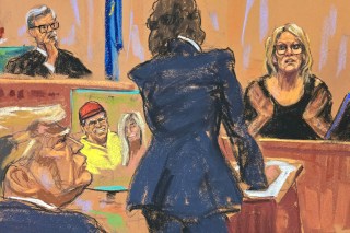 Stormy Daniels questioned by the prosecutor Susan Hoffinger before Justice Juan Merchan and Trump, with a photo of the pair on display