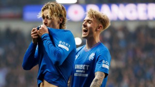 Cantwell celebrates Rangers’ third goal with McCausland