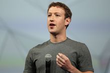 Mark Zuckerberg addresses a crowd with a microphone