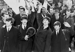 The Beatles arrive in the U.S. black and white photograph.