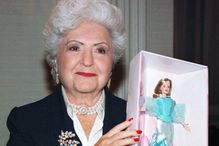 Ruth Handler holds a Barbie doll, 1999.