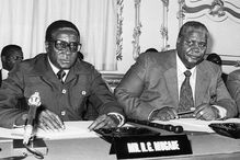 Robert Mugabe and Joshua Nkomo