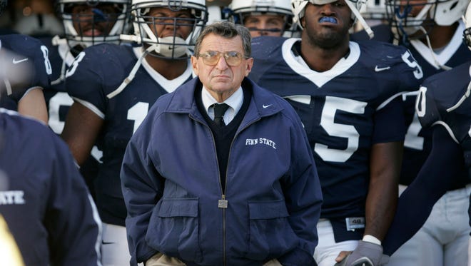 Joe Paterno's victory total stands at 409, putting him ahead of former Florida State coach Bobby Bowden, who has 377 career wins.