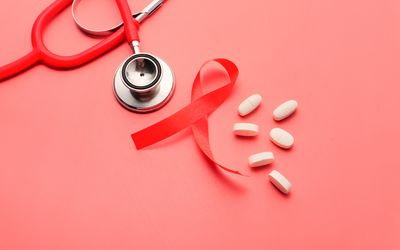 HIV ribbon and medications