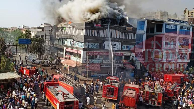 Surat fire: 22 killed in coaching centre blaze, horrific visuals show kids falling off burning  building 