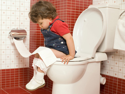Little girl on toilet