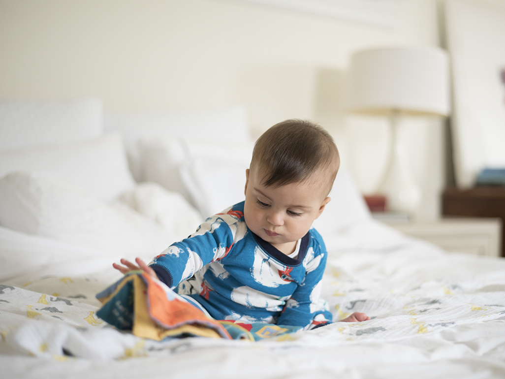 toddler on the bed
