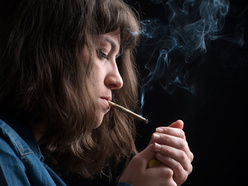 Woman smoking cannabis