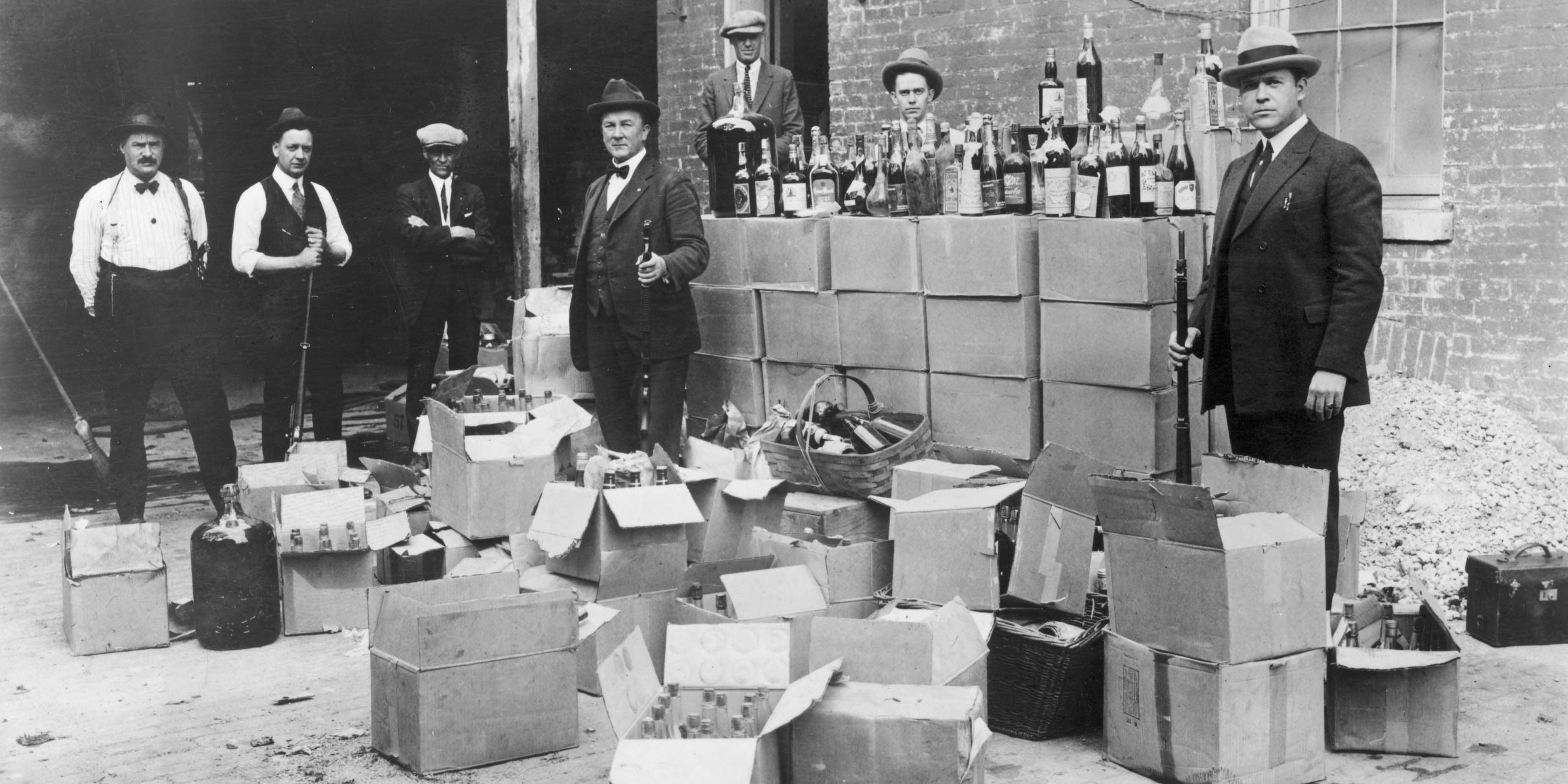 Revenue agents during raid on a speakeasy, Prohibition period. Photo, Washington, April 25, 1923.