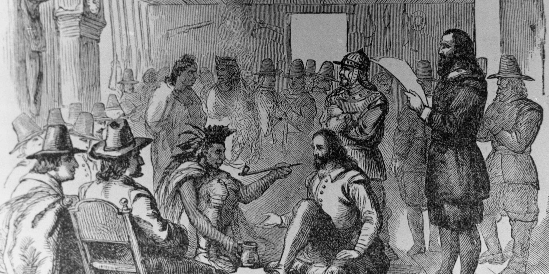 Ousamequin, chief of the Wampanoag signs a peace treaty with Governor John Carver (1576 - 1621).