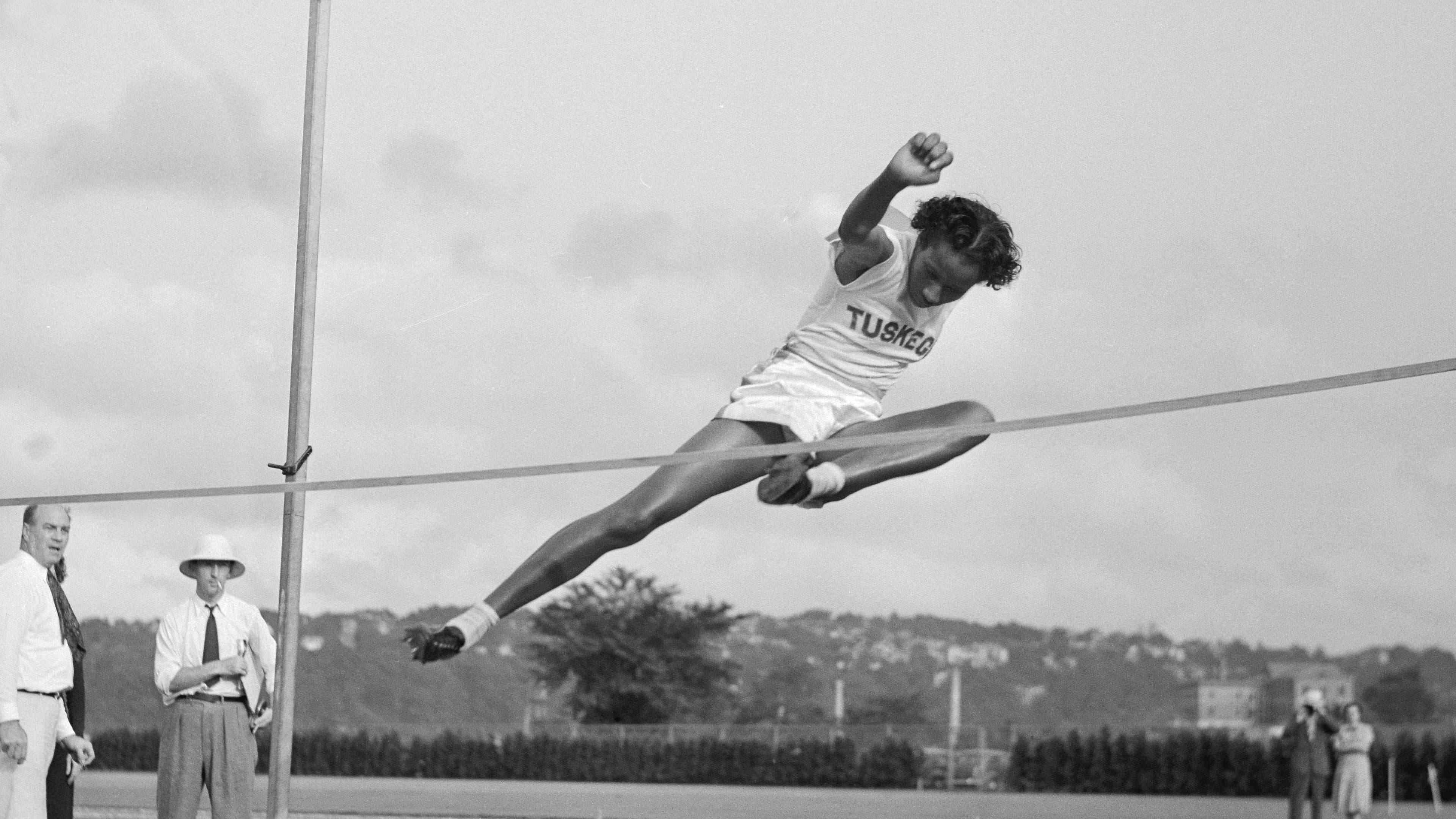 Alice Coachman performs in the high jump competition at the 1939 National Women's Track and Field meet.
