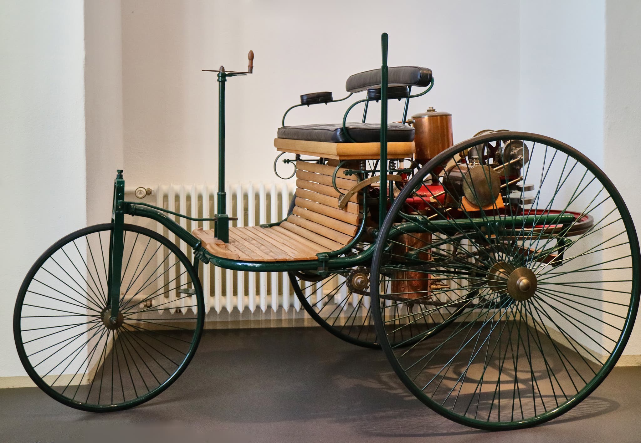 The world&#039;s first automobile: a 3-wheeled open buggy designed by Carl Benz in 1886, seen in the Dresden Transport Museum