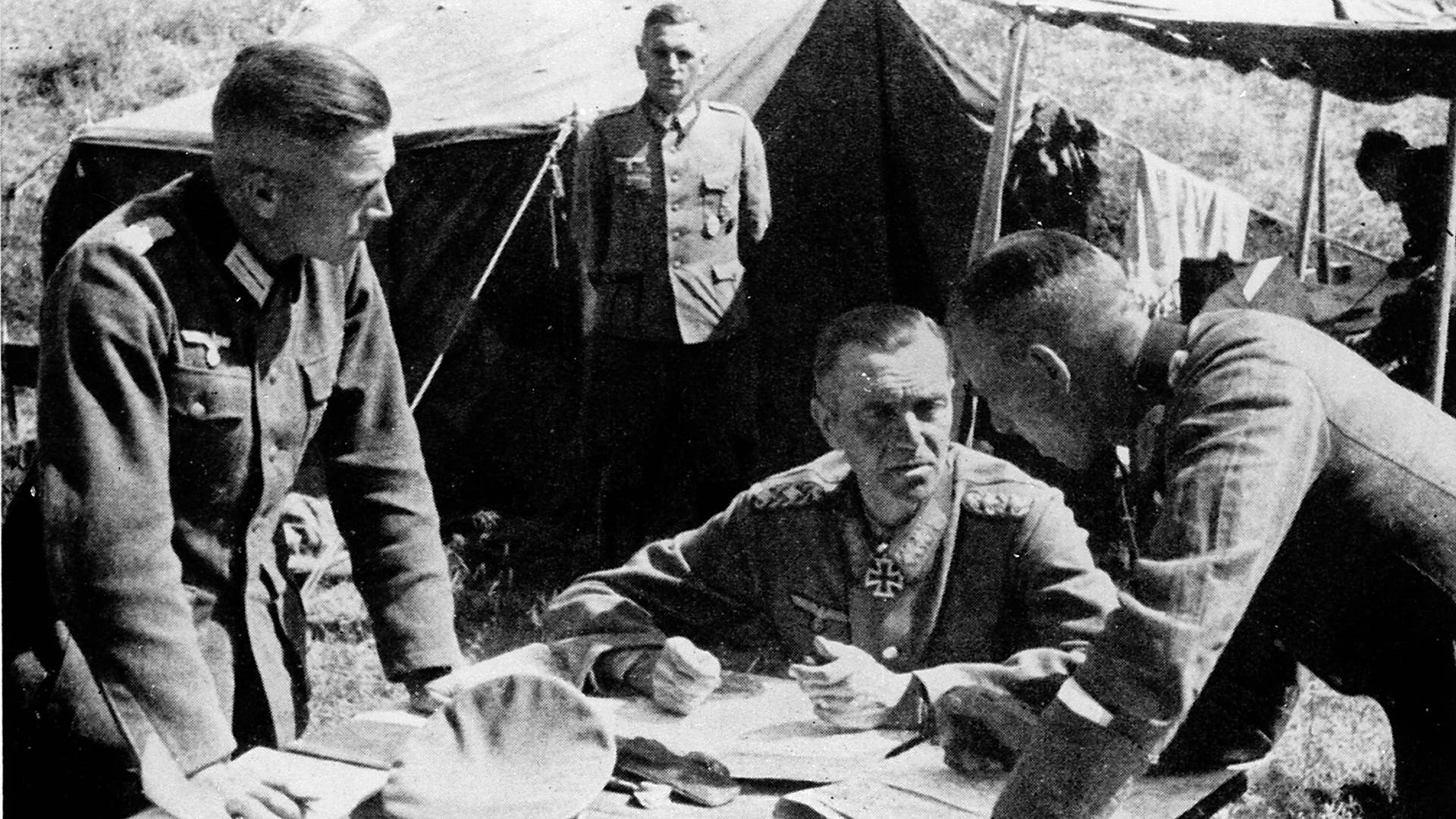 German General Friedrich Paulus (seated) confers with his staff of the VIth army in front of Stalingrad, September 1, 1942.