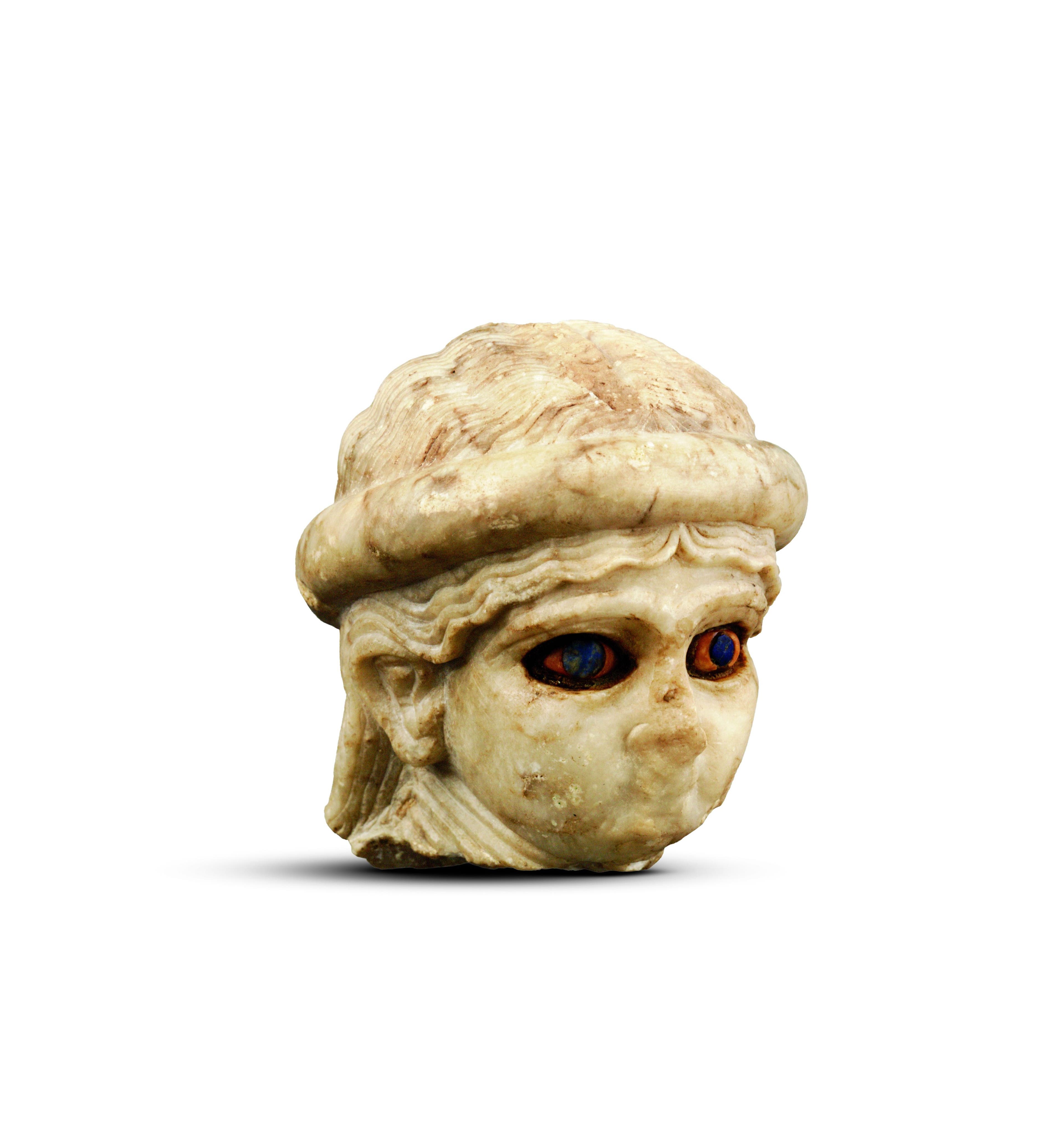 Head of a high priestess with inlaid eyes Mesopotamia, Akkadian, Ur (modern Tell el-Muqayyar), area EH, south of gipar Akkadian period (ca. 2334–2154 BC) Alabaster, shell, lapis lazuli, and bitumen; 9.5 × 8 × 8.5 cm. University of Pennsylvania Museum of Archaeology and Anthropology, Philadelphia, USA, excavated 1926; B16228
