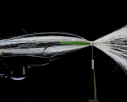 Tie in 8-10 strands of silver ho lographic flashabou on top of the white Squimpish Hair.