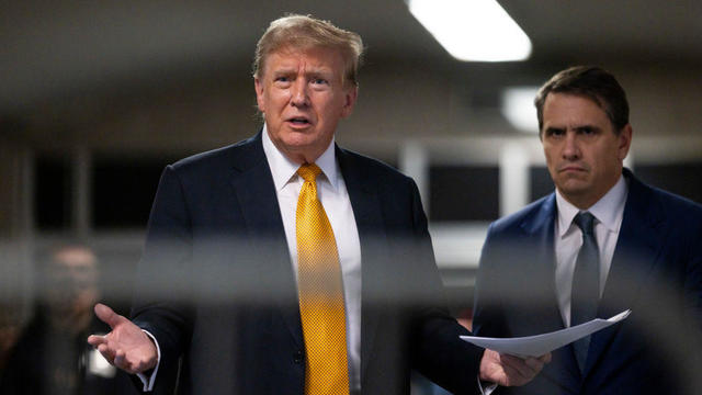 Former President Donald Trump talks to the press at the end of the day at his criminal trial at Manhattan Criminal Court on May 21, 2024, in New York City. 