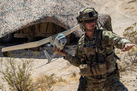 A Soldier launches an RQ-11B Raven small, unmanned aircraft system during tactical training at Fort Irwin, Calif., Aug. 22, 2023.