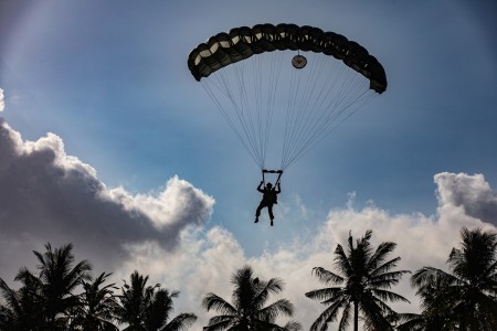 An Army Special Forces Soldier parachutes during Exercise Super Garuda Shield in Banyuwangi, Indonesia, Aug. 30, 2023. The annual exercise is a joint, multinational event focused on maintaining a free and open Indo-Pacific.
