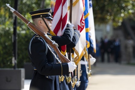 The color guard parades the colors during a September 11 Pentagon Staff Memorial Observance in the courtyard of the Pentagon, Washington, D.C., Sept. 8, 2023.