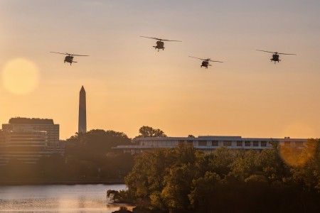 Army UH-60 Black Hawk helicopters fly over the Potomac River in Washington during the 39th Annual Army Ten-Miler, Oct. 8, 2023. The race promotes the Army, builds esprit de corps, supports Army fitness goals and enhances community relations.