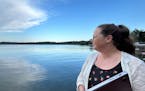 Tamara Thomsen, a maritime archaeologist with the Wisconsin Historical Society, looks out over the stretch of Lake Mendota where several ancient canoe