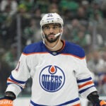 Edmonton Oilers' Evander Kane (91) prepares for a face off against the Dallas Stars in Game 1 of the NHL hockey Western Conference Stanley Cup playoff finals, Thursday, May 23, 2024, in Dallas.
