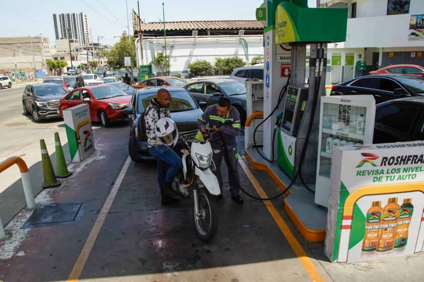 Tijuana, Baja California - May 22: A blockage at the PEMEX plant in Playas de Rosarito has caused a gasoline shortage at gas stations in Tijuana, Rosarito, and Tecate. Customers wait in line to fill up at a BP Gas station in Downtown on Wednesday, May 22, 2024 in Tijuana, Baja California. (Alejandro Tamayo / The San Diego Union-Tribune)